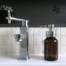 Glass foaming soap dispenser with chrome pump